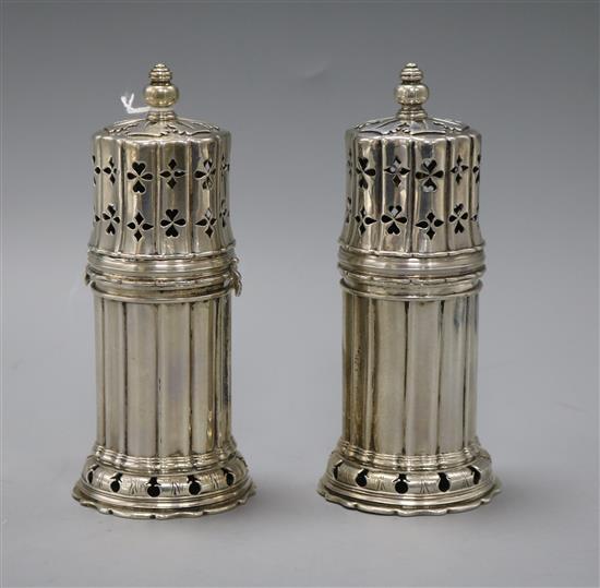 A pair of George V silver lighthouse sugar casters, Vander & Hedges (Tessier), London 1911, 16 oz.